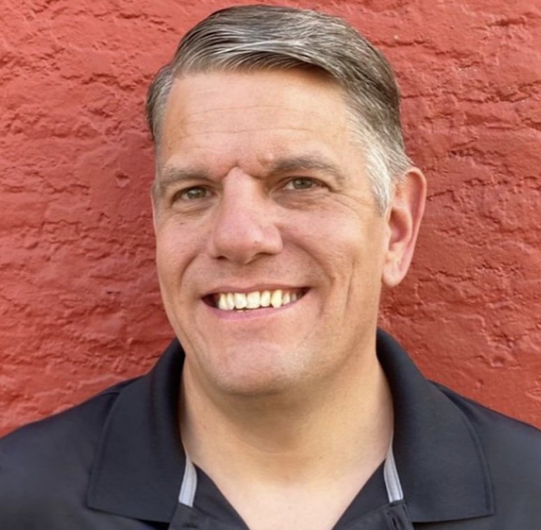Headshot of Adam Miezio